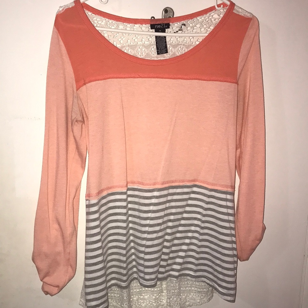 Rue21 long or mid-rise shirt.